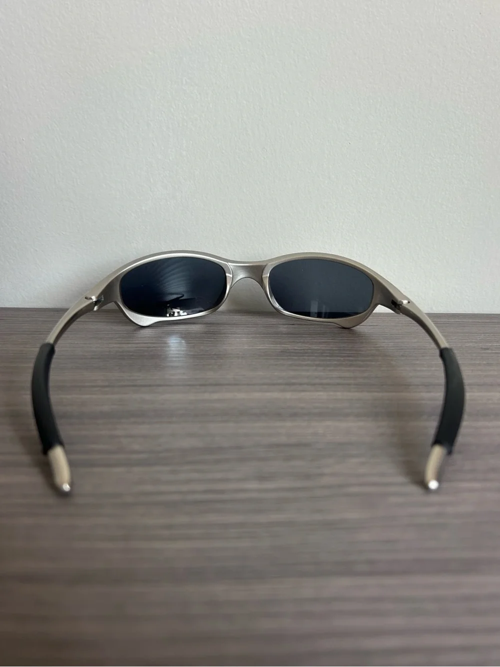 Oakley Men's Silver Frame Sunglasses with Black Lenses